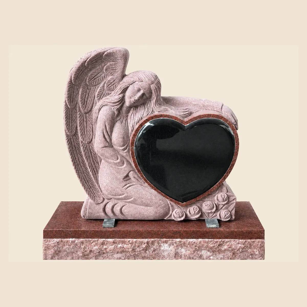 Mountain Rose granite angel cradling a black heart on a red base