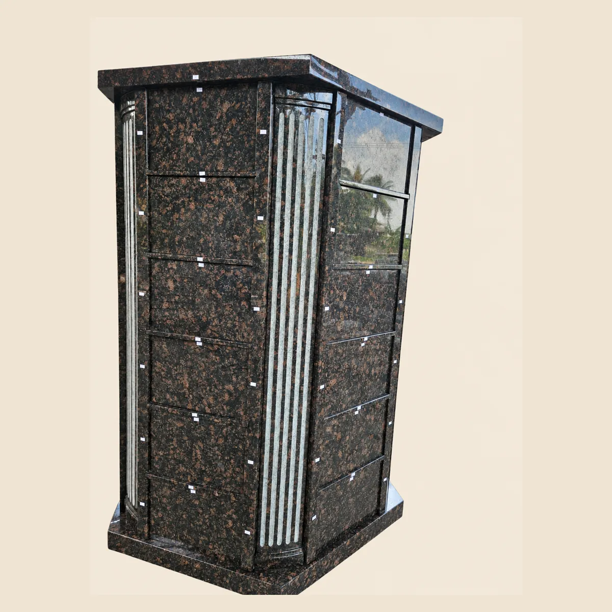 Tan Brown granite four-sided columbarium with fluted corner columns